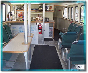 The Galley and Salon on The NEW Velocity. Stagnaro Sport Fishing, Charters and Whale Watching Cruises, Santa Cruz and Monterey Bay, California (CA)